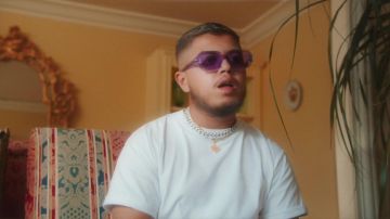 The glasses are purple, and transparent Hamza in his clip Validated