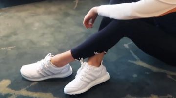 The pair of sneakers Adidas of Karlie Kloss in the video What I Eat In A Day On The Road | Shanghai Edition