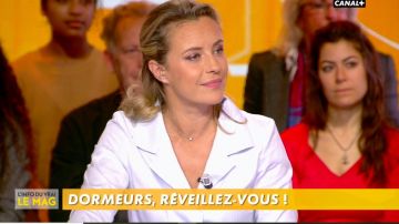 The white shirt in cotton twill with Isabelle Moreau in The Info of the true 24.10.2019