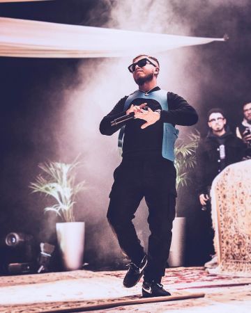 The jacket blue leather Louis Vuitton of Hamza on his account Instagram @hamzasaucegod