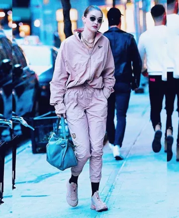 Reebok Gigi Hadid Track Pants in Field Tan worn by Jelena Noura "Gigi" Hadid New York City October 25, 2019
