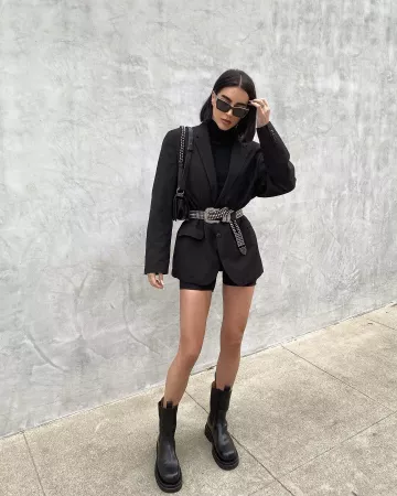 The black boots of Brittany Xavier on his account Instagram @brittanyxavier