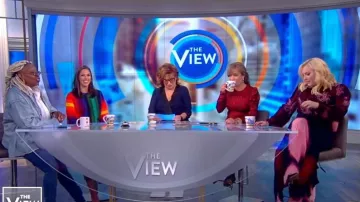 Maje Ravie Flo­ral-Print Satin Mi­di Dress worn by Sunny Hostin on The View October 25, 2019