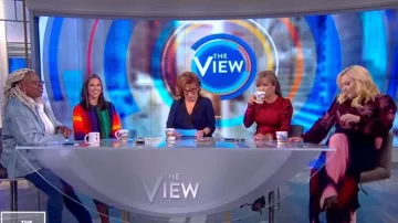 L'Agence Ky­la Navy Draped Blouse worn by Joy Behar on The View October 25, 2019