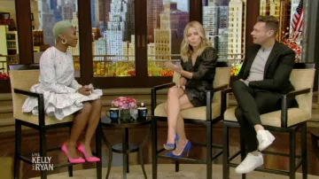 Ba&sh Black Dot­ted Ruf­fled Dress worn by Kelly Ripa on LIVE with Kelly and Ryan October 24, 2019