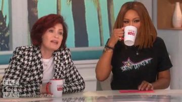 Saint Laurent Black Print­ed Tshirt worn by Eve on The Talk October 29, 2019