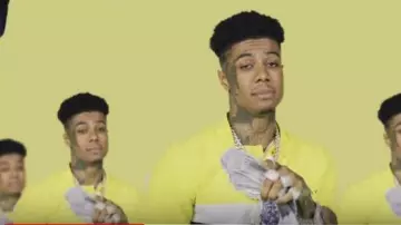 Givenchy Yellow Black Color block Polo worn by Blueface in the YouTube video Blueface - First Class ft. Gunna