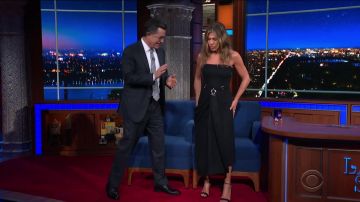 Cape dress on the Late Show with Stephen Colbert (29/10) of Jennifer Aniston in Jennifer Aniston On "Friends" Reunion Rumors: "Something Is Happening"