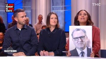 La chemise marine en soie à surpiqures de Valentine Oberti dans Quotidien
