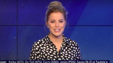 The shirt dress long printed foliage on a black background of Pauline Sanzey in Daily Sport the 02.11.2019