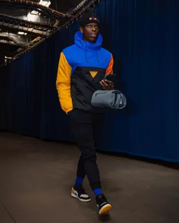 Les Sneakers Jordan 1 Low Sail University Gold Black de Dennis Schröder sur le compte Instagram de @leaguefits