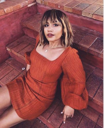 Vestire Pretty Woman orange dress worn by Jessica Mauboy on the Instagram account @jessicamauboy1