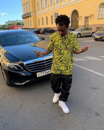 Off white Ny­lon Track Pants worn by Slim Jxmmi of Slim Jxmmi on the Instagram account @slimjxmmi