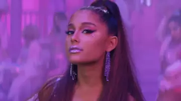 Purple pinkish rhinestone earrings of Ariana Grande in the music video 7 rings