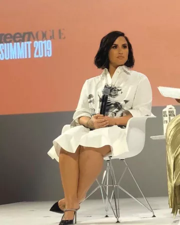 Jimmy Choo Bing Patent Jeweled Mules worn by Demi Lovato Teen Vogue Summit November 2, 2019