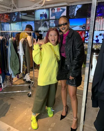 Fred Perry Raf Simons Rollneck Photographic Print Top worn by Rihanna Out in Tokyo October 31, 2019