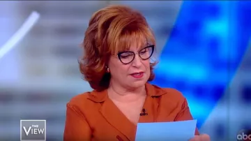 L'Agence Orange Rita Drape Blouse worn by Joy Behar on The View November 04, 2019