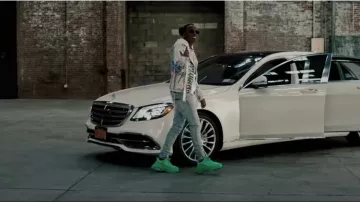 Balenciaga All Green Triple S Sneak­ers worn by Rich the Kid in his Racks Today