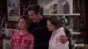 Red Christmas sweater worn by Kayla (Ashley Tisdale) in Merry Happy Whatever (S01)