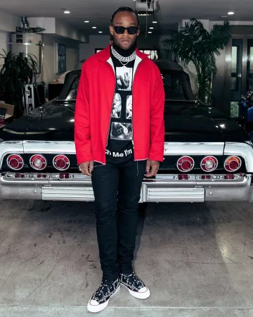 Converse x Jw Anderson Grid Black Sneak­er of Ty Dolla $ign on the Instagram account @tydollasign