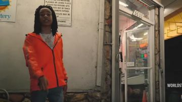 Superdry Or­ange Jack­et of YBN Nahmir in the music video YBN Nahmir "Tweak" (WSHH Exclusive - Official Music Video)