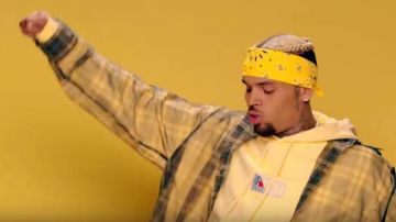 Kith Hood­ie Yel­low worn by Chris Brown in the YouTube video Chris Brown - Wobble Up (Official Video) ft. Nicki Minaj, G-Eazy