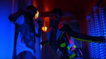 Gucci Brown Nylon GG Oversized Lounge Pants of Tyga in the music video Shenseea - Blessed (feat. Tyga) (Official Music Video)