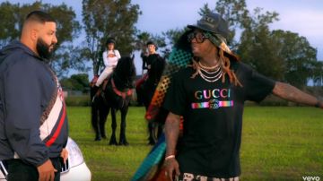 Gucci Black Lo­go Print Leather Base­ball Cap worn by Lil Wayne in the YouTube video DJ Khaled - Jealous ft. Chris Brown, Lil Wayne, Big Sean (Lyrics)