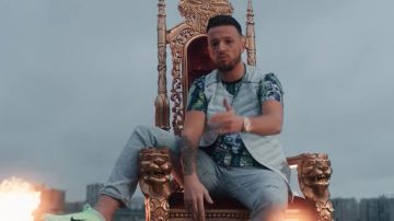 Sky blue puffer jacket without sleeves of Azet in AZET - SEELE (prod. by Jugglerz)