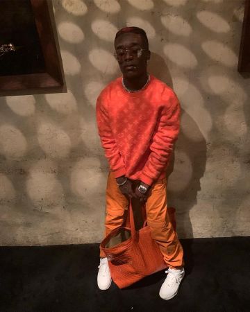 Dries Van Noten Croc Braza de cuero en relieve de Lil Uzi Vert en la cuenta de Instagram @liluzivert