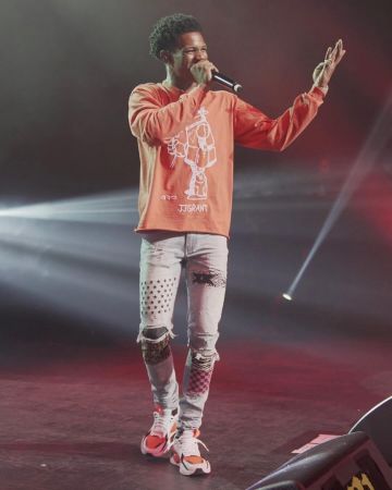 Amiri Light Blue Patched slim jeans de A Boogie wit da Hoodie en la cuenta de Instagram @artisthbtl