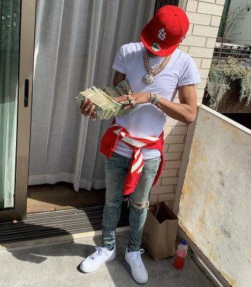 Amiri Paint Splatter Distressed Skinny Jeans de Lil Baby en la cuenta de Instagram @lilbaby_1