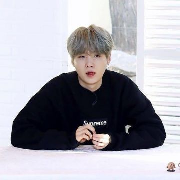 Black Supreme logo hoodie of Suga (BTS) on the Instagram account @suga__ibighit