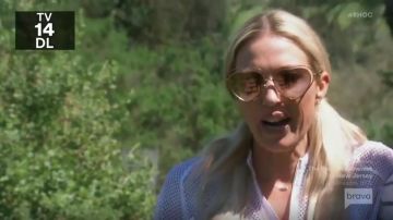 Chloe Eye­wear Heart Shaped Sun­glass­es worn by Braunwyn Windham in The Real Housewives of Orange County Season 14 Episode 14
