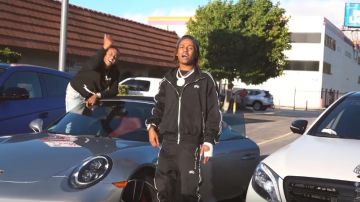 Amiri Black side leather stripe track pants de Rich the Kid en el video musical Rich The Kid - 4 Phones [Official Music Video]