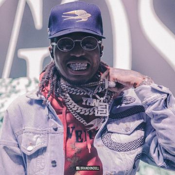 Amiri Light Blue chaqueta vampelleada de serpiente de Quavo en la cuenta de Instagram @quavohuncho