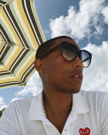 Comme Des Garçons Play Blanc coeur patch chemise polo de Pharrell Williams sur l'Instagram account @pharrell