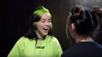 Blohsh necklace logo charm "Billie Eilish Merch" worn by Billie Eilish for her Billie Eilish Surprises Her Biggest Fans | Just Dance 2020