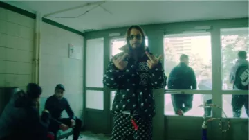 The black pants patterned with white worn by SCH in SCH - A. A. C. (Clip official)