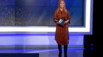 The printed dress satin effect of Pauline Sanzey in Daily Sport the 08.11.2019