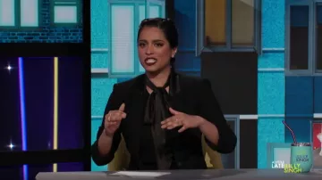 Elie Tahari Elisan­dra Neck Sash Top worn by Lilly Singh on A Little Late with Lilly Singh November 8, 2019