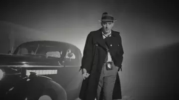 The tie in stripes of G-Eazy in his clip Hittin Licks