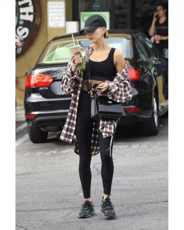 Adidas Lx­con Dart Frog Sneak­ers worn by Hailey Baldwin Earth Bar November 13, 2019