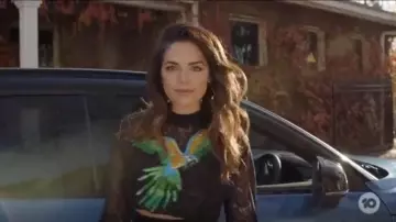 Pinko Par­rot Sweater worn by Tahlia Woods (Olympia Valance) in Playing for Keeps Season 02 Episode 01