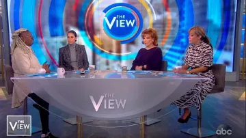 All Saints Xe­na Zephyr Pleat­ed Mi­di Dress worn by Sunny Hostin on The View November 14, 2019