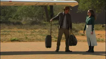 Bottes noir de Kate (Kristin Davis) dans Un safari pour Noël