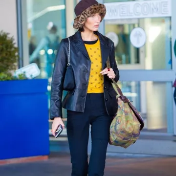 Chanel Graf­fi­ti Em­broi­dered Mes­sen­ger Bag worn by Bella Hadid JFK Airport November 16, 2019