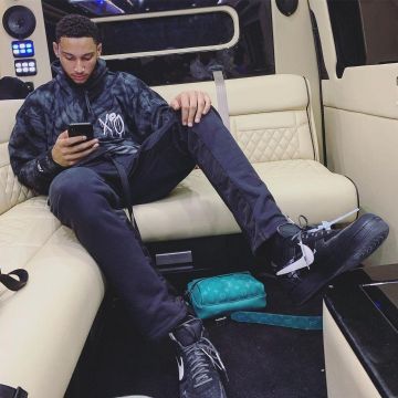 Burgundy Varsity Bomber Jacket worn by Ben Simmons on the Instagram account  of @leaguefits
