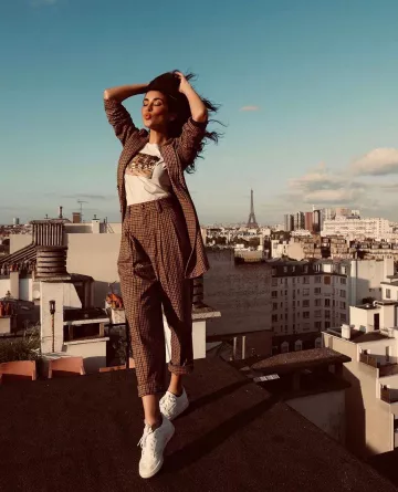 Sneackers blanche de Reem Kherici sur le compte Instagram de @reemkherici