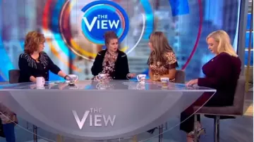 Shrimps Pe­ga­sus faux-fur coat worn by Helena Bonham Carter on The View November 18, 2019